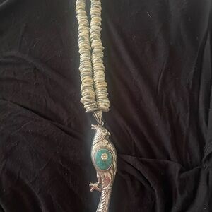 Tibetan style turquoise bird pendant necklace.